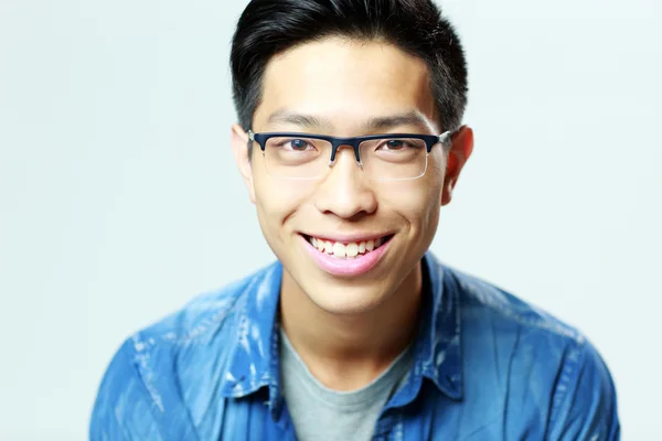 Young handsome asian man in glasses — Stock Photo, Image