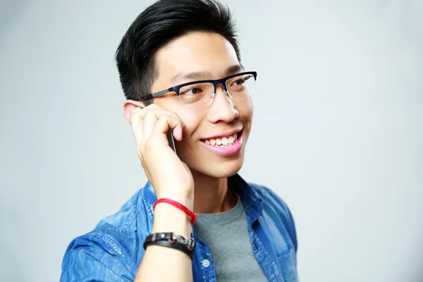 Young handsome asian man in glasses — Stock Photo, Image