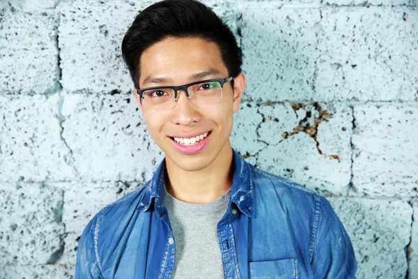 Young handsome asian man in glasses — Stock Photo, Image