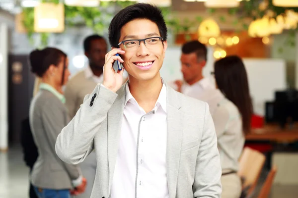 Handsome group of business people in office — Stock Photo, Image