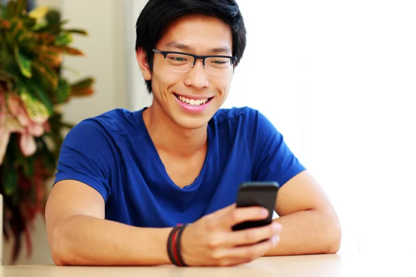 Handsome asian man at home — Stock Photo, Image