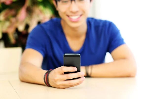 Handsome asian man at home — Stock Photo, Image