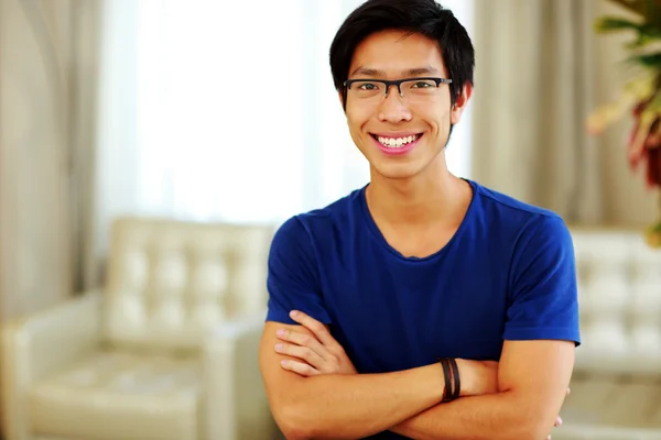 Handsome asian man at home