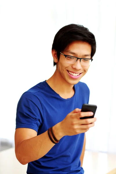 Handsome asian man at home — Stock Photo, Image