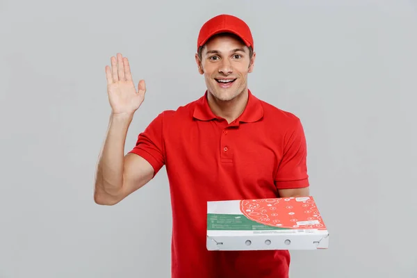 Junger Zusteller Mit Hut Gestikuliert Während Mit Pizzaschachtel Vor Weißer — Stockfoto