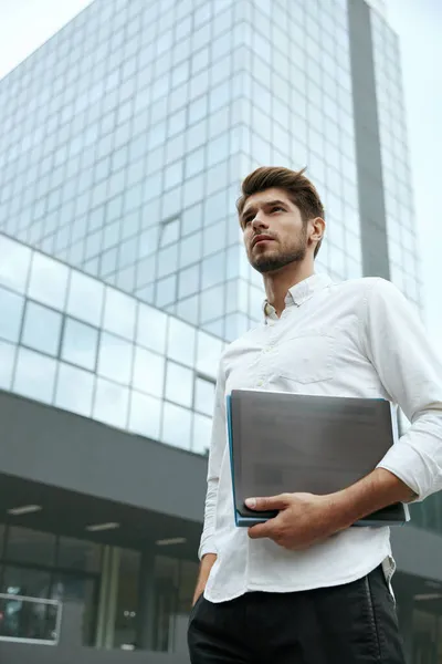 Young European Businessman Holding Paper Documents Man Standing Background Modern — Stock Photo, Image