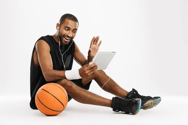 Happy African Young Basketball Player Sitting Talking Tablet Computer Earphones — Stock Photo, Image