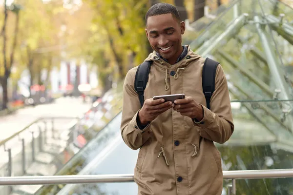 Smiling Black Male Student Standing Typing Mobile Phone Young African — Stock Photo, Image