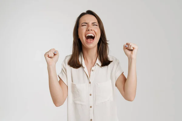 Young Woman Making Winner Gesture Screaming Camera Isolated White Background — ストック写真
