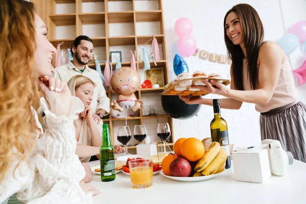 Group Happy Friends Celebrating Baby Shower While Standing Banquet Table — Stock Photo, Image