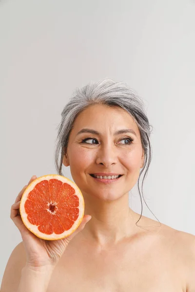 Mature Shirtless Woman Grey Hair Showing Grapefruit Isolated White Background — Stock Photo, Image