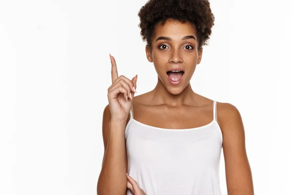 Young Black Woman Tank Top Exclaiming Pointing Finger Upward Isolated — ストック写真