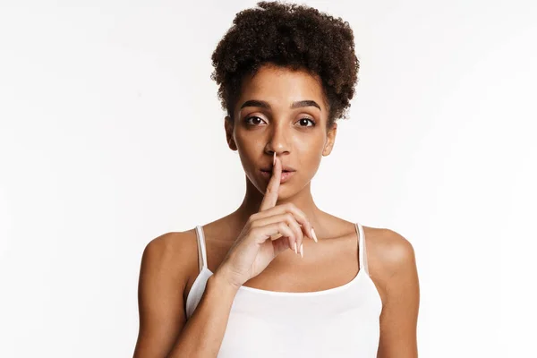 Young Black Woman Tank Top Showing Silence Gesture Camera Isolated — ストック写真