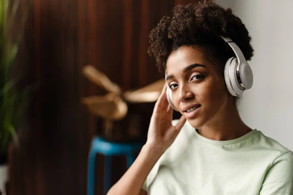 Young Black Woman Listening Music Headphones Home — 图库照片