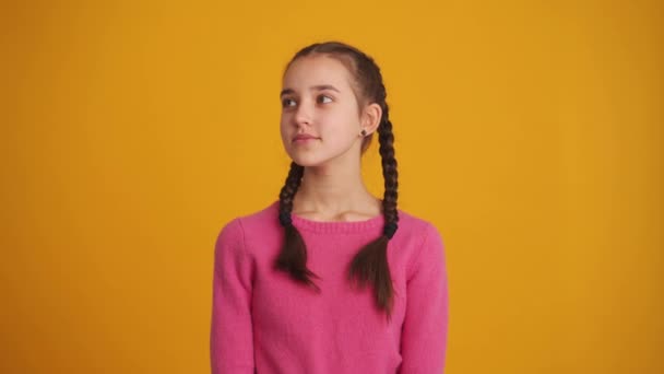 Handsome Girl Pigtails Looking Melting Camera Yellow Studio — Vídeo de Stock