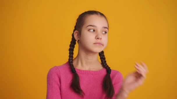 Bored Girl Pigtails Looking Yellow Studio — Stock video