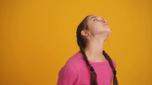 Tired Girl Pigtails Showing Blah Gesture Yellow Studio — Vídeo de Stock