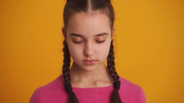 Cheerful Girl Pigtails Opening Her Eyes Camera Yellow Studio — Vídeo de Stock