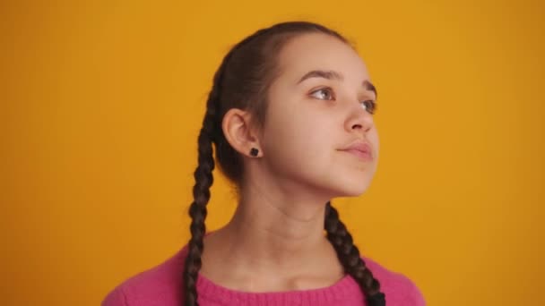 Sad Girl Pigtails Looking Yellow Studio — Vídeo de Stock