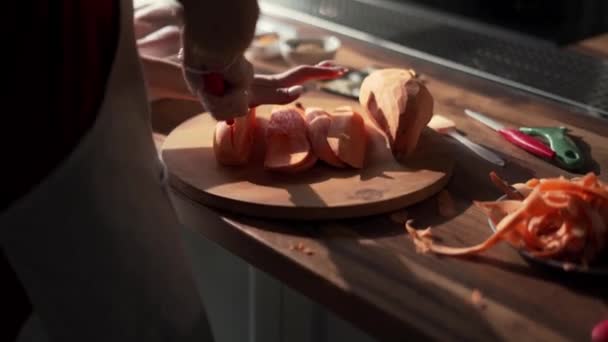 Female Hands Cuts Sweet Potato Plank Kitchen — Wideo stockowe