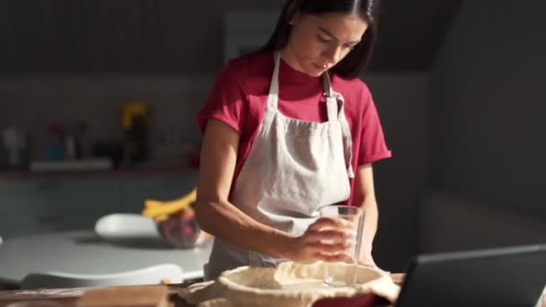 Serious Woman Crushing Glass Dough Baking Sheet Kitchen — Stockvideo