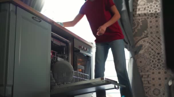 Handsome Brunette Woman Put Dishes Dishwasher Kitchen — стоковое видео