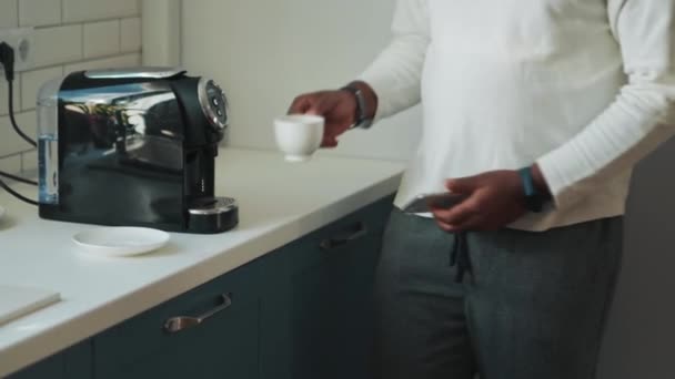 African Man Holding Cup Coffee Home — Stock video