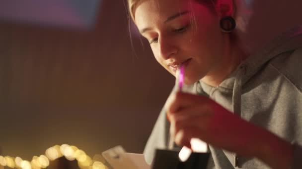 Positive Woman Eating Chinese Food Watching Film Room Home — Video