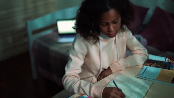 Concentrated African Young Girl Doing Homework Home — Vídeo de Stock