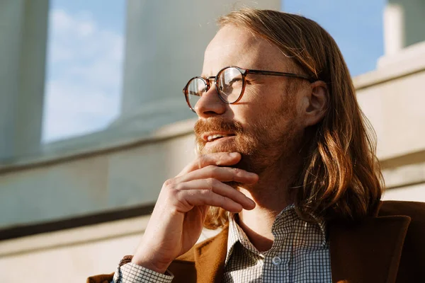 White Ginger Man Wearing Jacket Eyeglasses Looking Aside Outdoors —  Fotos de Stock