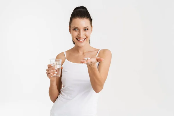 European Woman Wearing Underwear Smiling While Taking Vitamins Isolated White — Zdjęcie stockowe