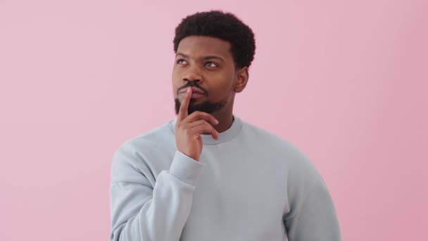 Pensive African Man Wearing Sweatshirt Thinking Something Pink Studio — Stock Video