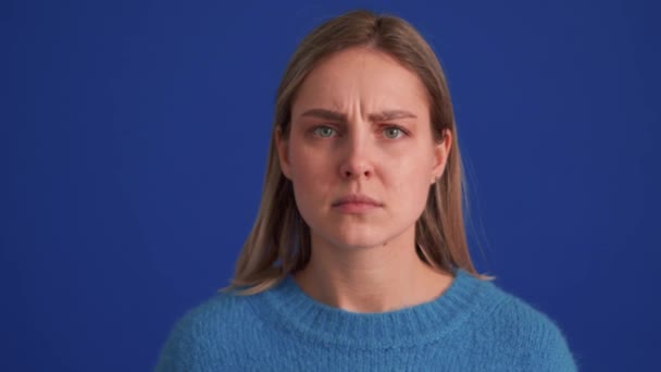 Angry Woman Wearing Blue Sweater Showing Shh Gesture Blue Studio — Stock Video