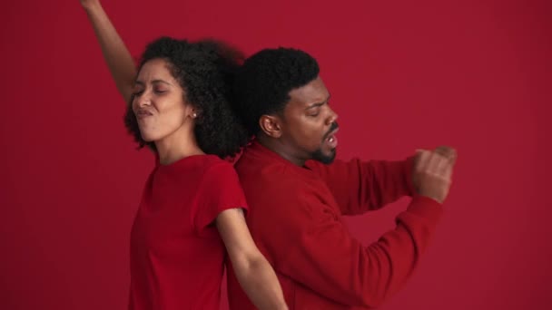 Cheerful African Couple Dancing Red Studio — Stock Video