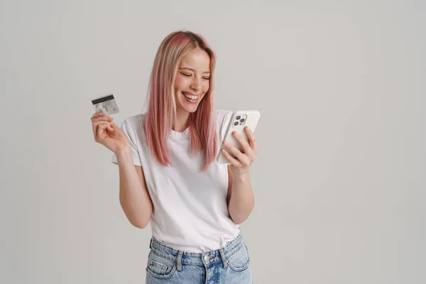 Young Laughing Woman Posing Credit Card Cellphone Isolated White Background — Stock Photo, Image