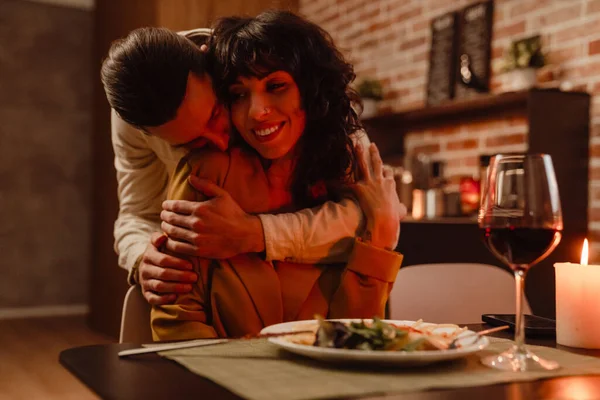 White Couple Hugging While Having Romantic Dinner Home Indoors — Stock Photo, Image