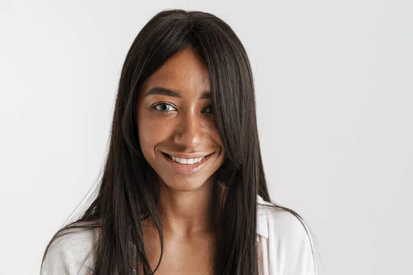 Smiling Young African Woman Long Dark Hair Standing White Wall — Stock Photo, Image