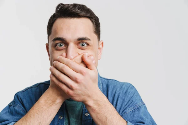 Young Excited Man Covering His Mouth Looking Camera Isolated White — Stock Photo, Image