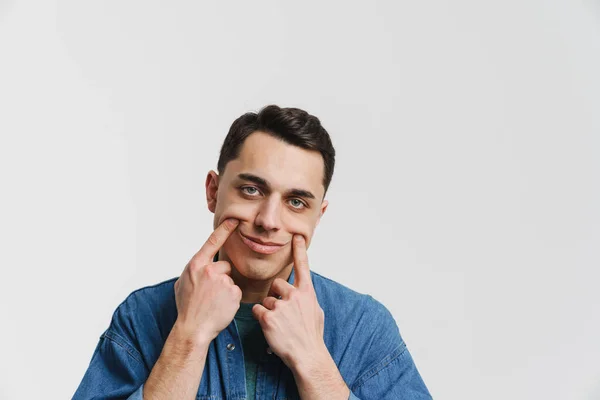 Young Brunette Man Dressed Denim Shirt Making Smile His Fingers — Stock Photo, Image