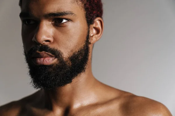 Black Shirtless Bearded Man Posing Looking Aside Isolated White Background — Stock Photo, Image