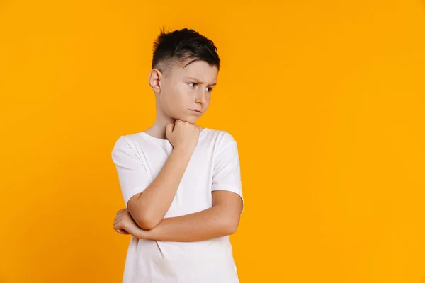 Brunette White Boy Shirt Frowning Looking Aside Isolated Yellow Background — Stock Photo, Image
