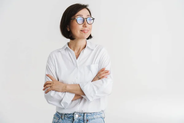 Smiling Mature White Woman White Shirt Glasses Standing Arms Folded — Stock Photo, Image