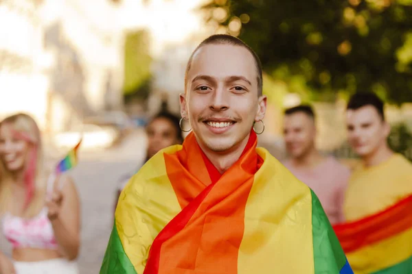 Close Smiling Young Man Holding Rainbow Flag Standing Group Smiling — 스톡 사진