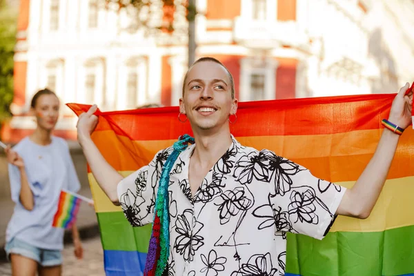 Close Smiling Young Man Holding Rainbow Flag Standing Group Smiling — Foto Stock