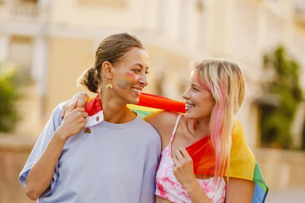 Young Lesbian Couple Standing Rainbow Flag Pride Parade Street Street —  Fotos de Stock