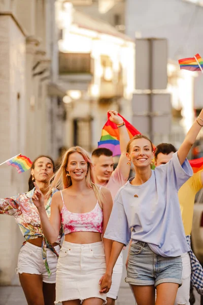 Multiracial Men Women Walking Rainbow Flags Pride Parade City Street — Zdjęcie stockowe