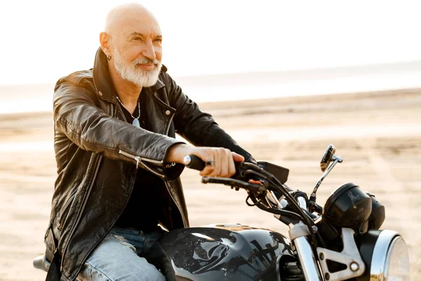 Bold Senior Man Wearing Leather Jacket Riding Motorcycle Outdoors Summer — Foto Stock