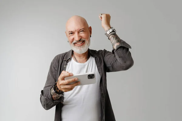 Bald European Man Playing Online Game Mobile Phone Isolated White — Stockfoto