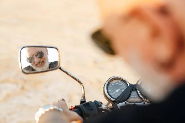 Bold Senior Man Looking Rear View Mirror While Riding Motorcycle — Stock Photo, Image