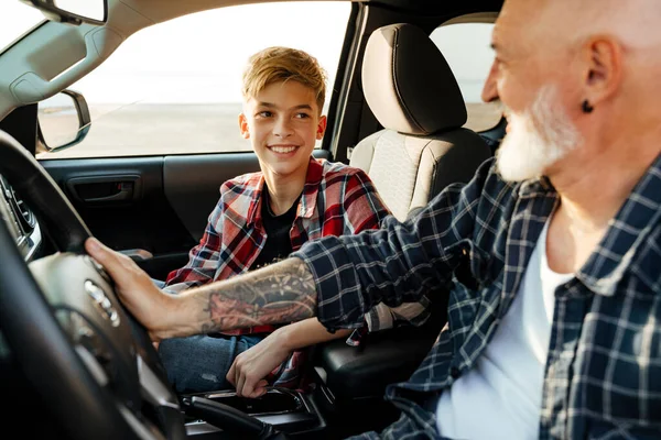 Happy Middle Aged Father His Preschooler Son Sitting Car Driving — Stockfoto